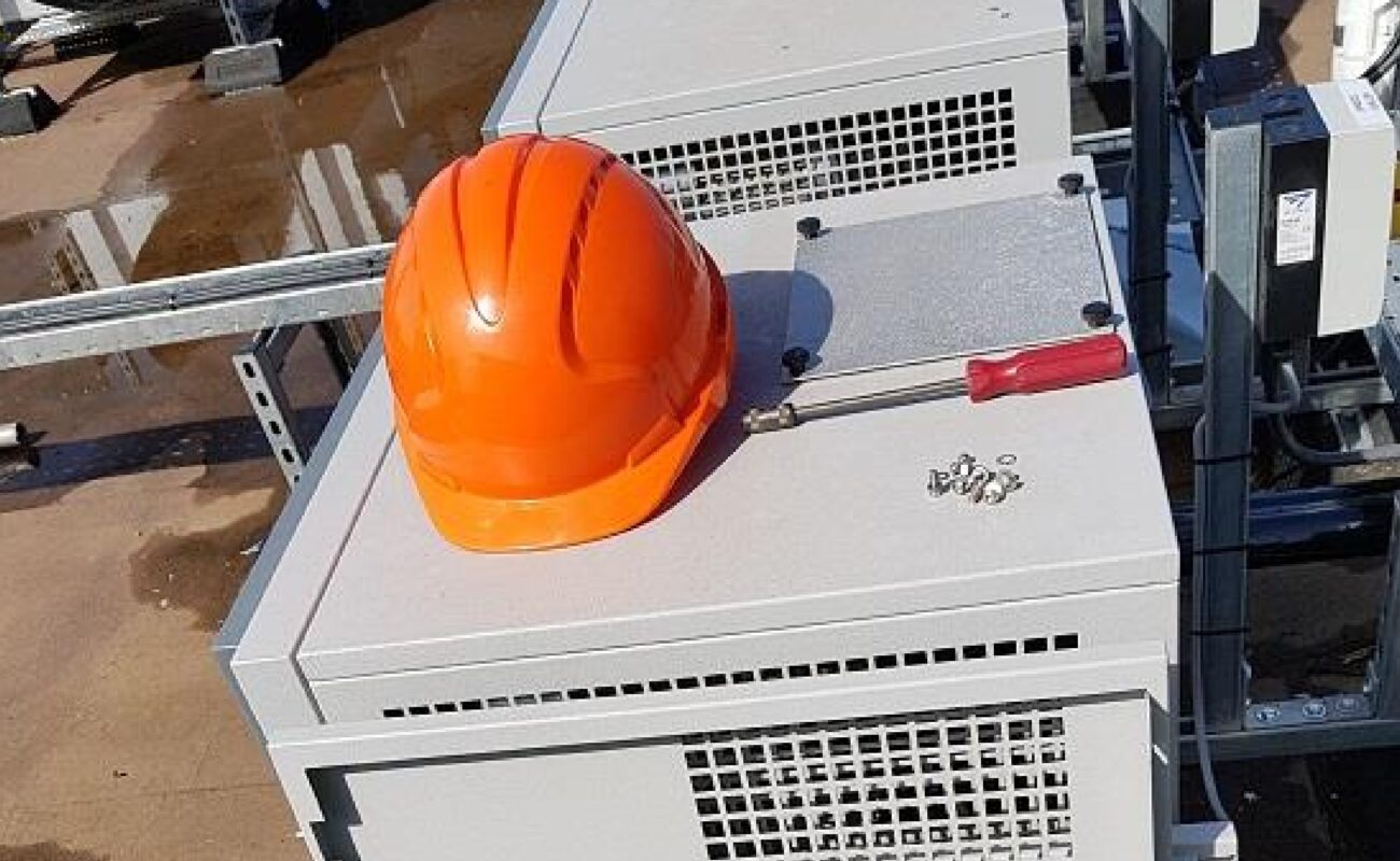 orange hat on generator